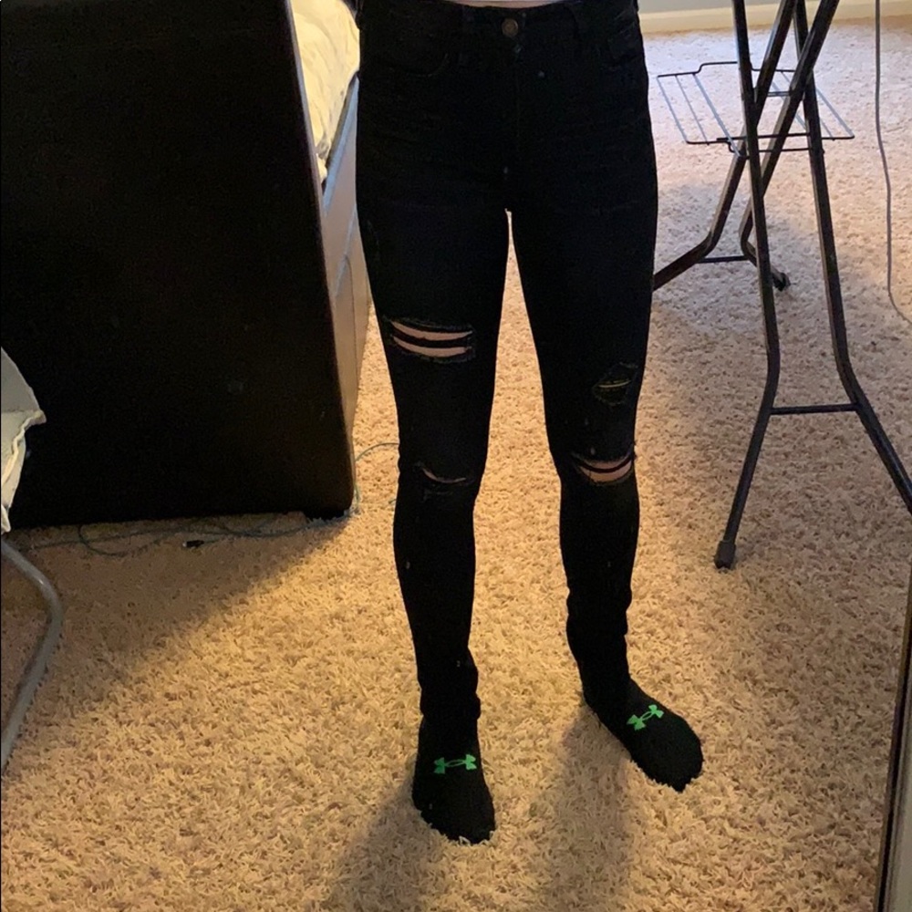 Black super skinny ripped jeans